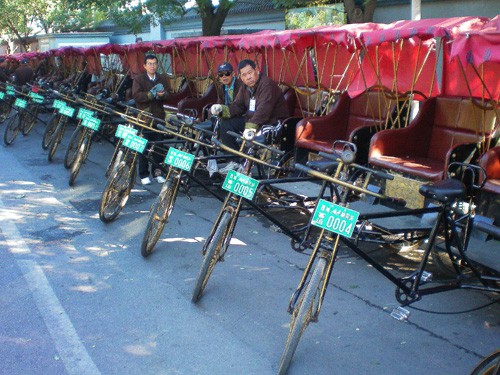 Pedicab drivers waiting for fares