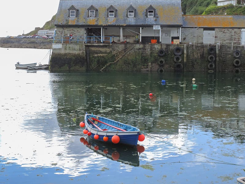 a boat in the harbor of Polperro - one of the places to visit in cornwall