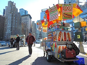 people by food carts, a good thing to do in New York in winter