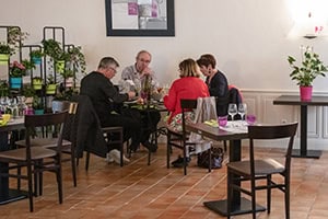 people in a restaurant near a chateau in the Loire Valley