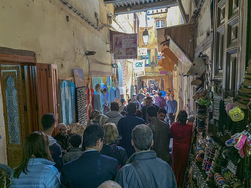 a crown of people in the Medina in Fez Morocco