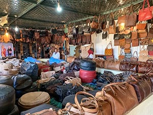 people in a leather shop