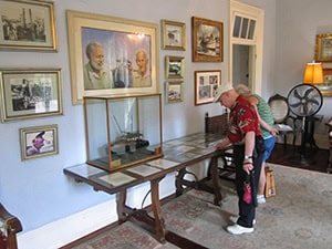 people looking at art work in a museum