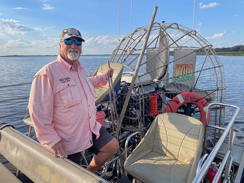 man standing on air boat seen on a trip from Orlando to Amelia Island