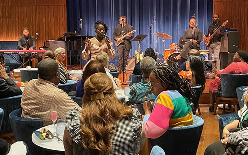 a rhythm and blues band playing in a small auditorium seen on a trip from Orlando to Amelia Island