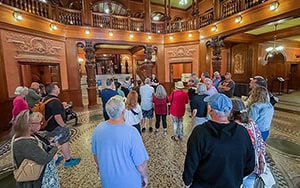 people in an ornately decorated foyer seen on a trip from Orlando to Amelia Island