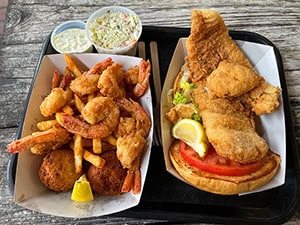 seafood in a take-out carton