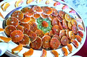 a plate of colorful oranges